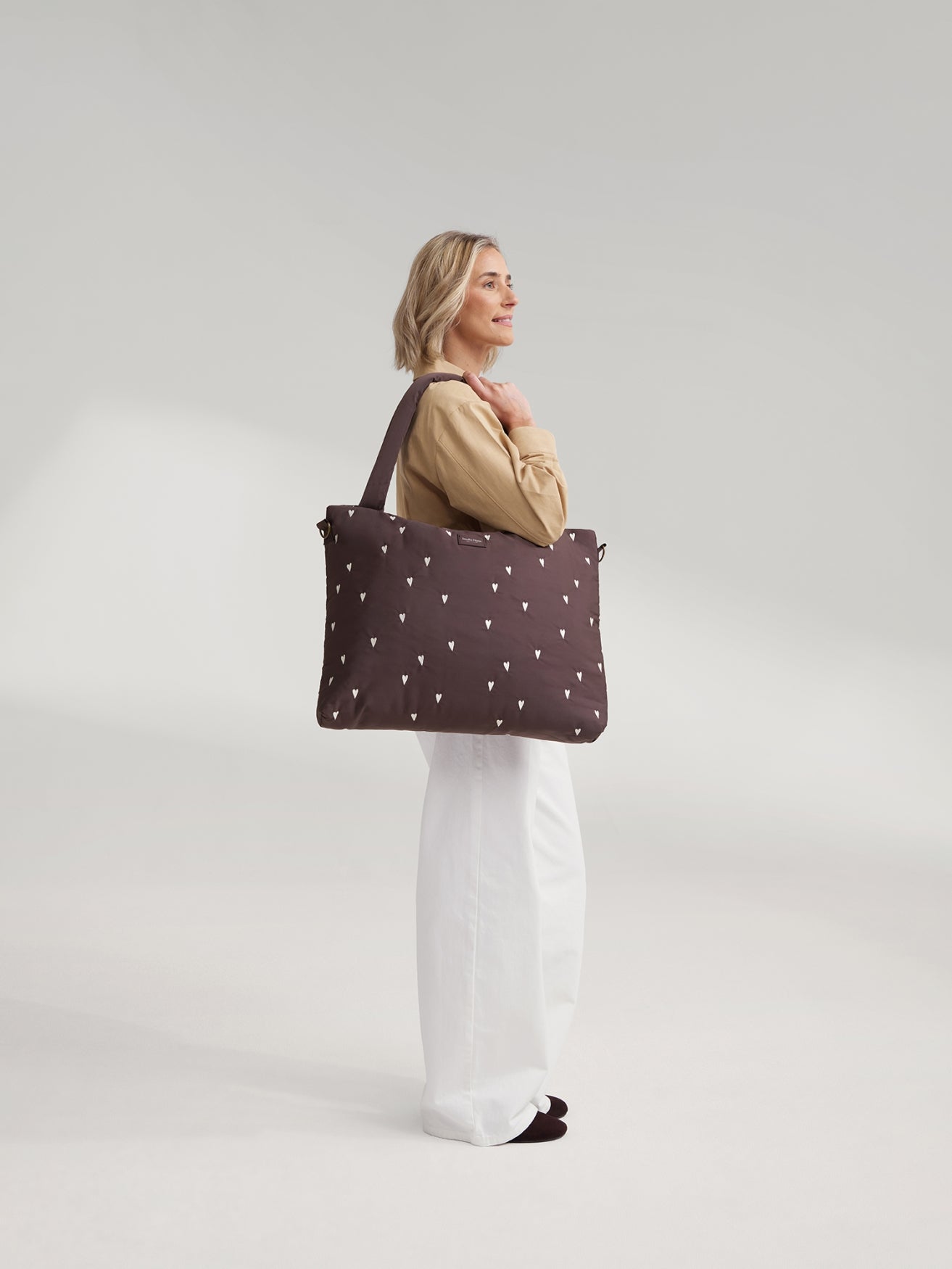 Studio Noos Puffy Wickeltasche Brown Hearts wasserabweisend