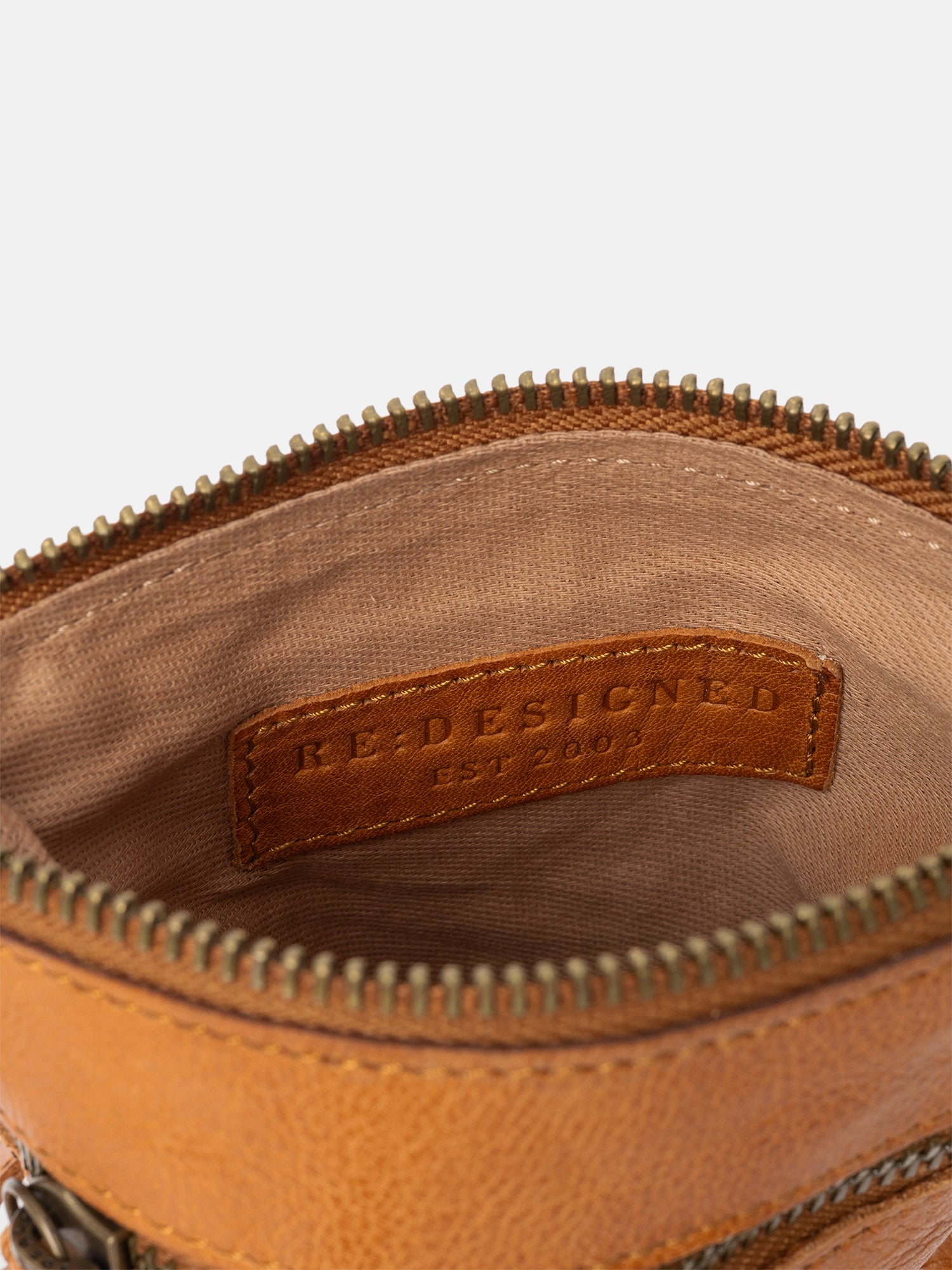 RE:DESIGNED Oulu Urban Handytasche Burned Tan Leder